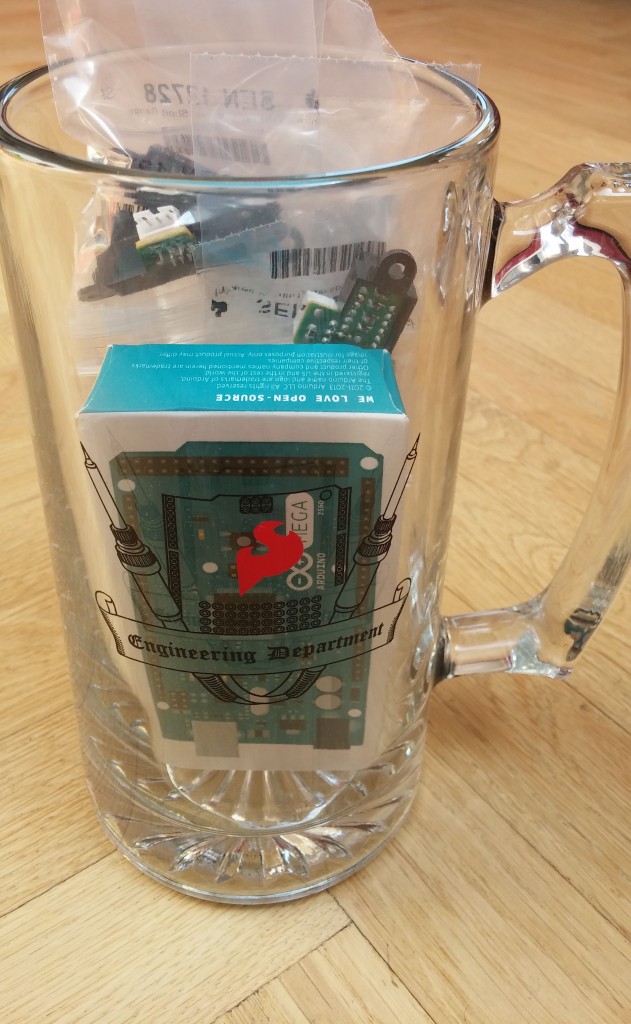 Beer mug filled with an arduino, shield, and sensors.